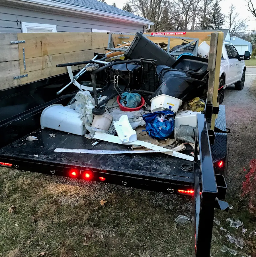 Roll-off dumpster delivered to a residential driveway in Greenfield