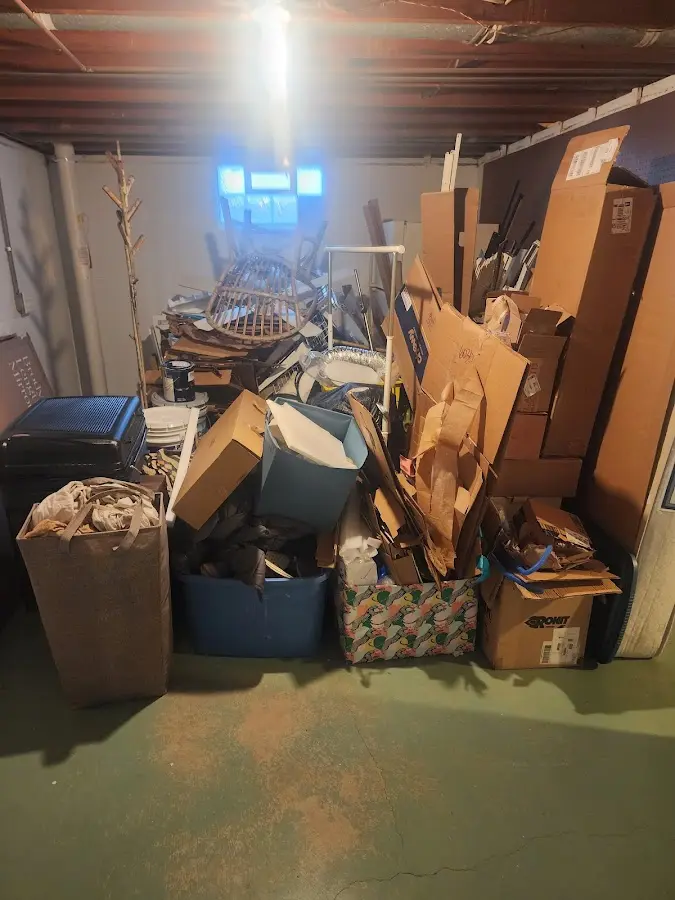 Roll-off dumpster container at job site for 2 Yard Dumpster Rental in Greenfield